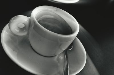 Close-up of coffee cup on table