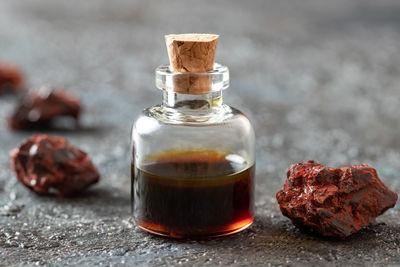 Close-up of drink in glass jar on table