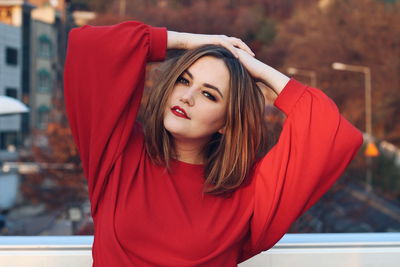 Portrait of beautiful woman standing outdoors