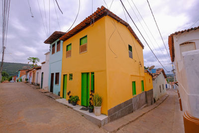 Road amidst buildings in town