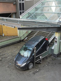 High angle view of abandoned car in city