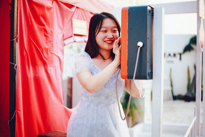 Young woman using mobile phone