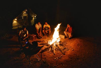 People burning at night