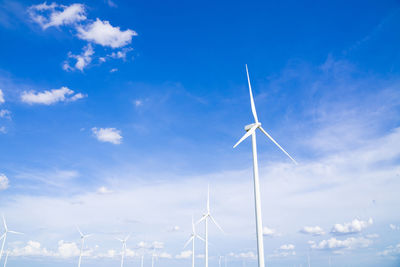 The wind turbines used to generate electricity provide clean energy to the earth on clear days.