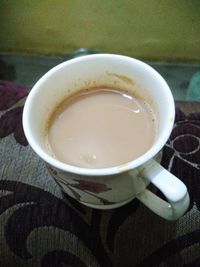 High angle view of coffee cup on table