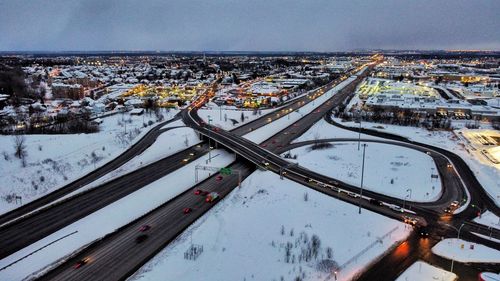 High angle view of city and highway during winter
