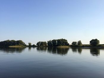 Scenic view of lake against clear sky