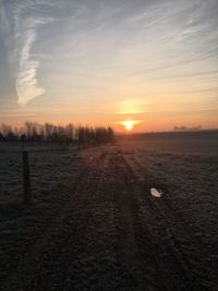 Scenic view of landscape at sunset