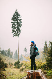 Rear view of man standing on mountain