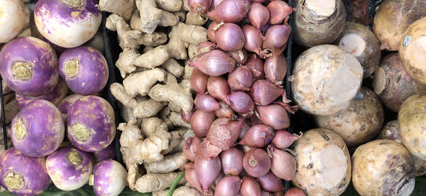 Full frame shot of onions for sale at market stall