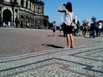 People in front of building