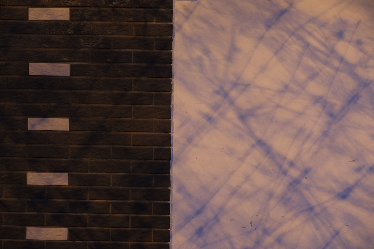 CLOSE-UP VIEW OF STONE WALL