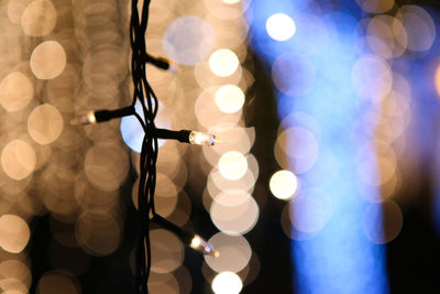 Close-up of illuminated string lights at night