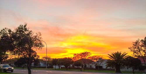 Scenic view of dramatic sky at sunset