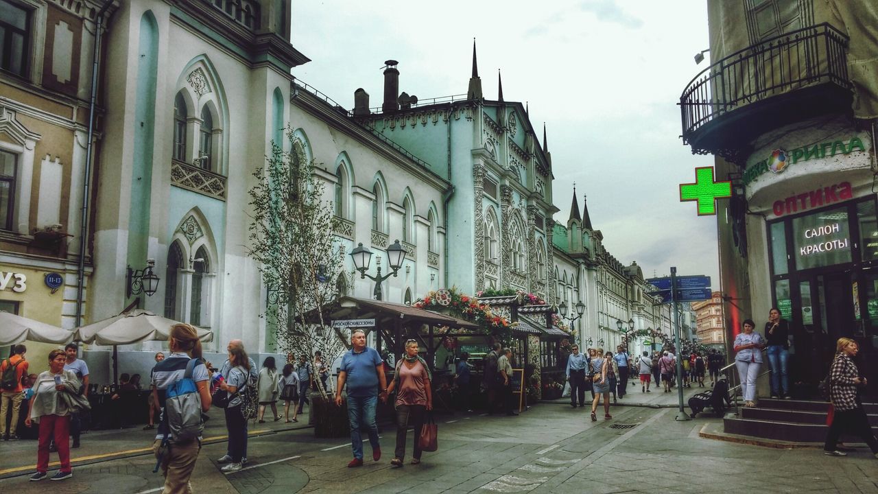 building exterior, architecture, built structure, city, city life, building, lifestyles, city street, outdoors, sky, day, leisure activity, the way forward, travel destinations