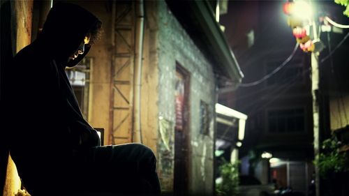 Man standing in front of building