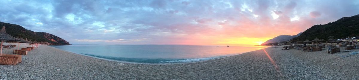 Panoramic view of sea against sky during sunset