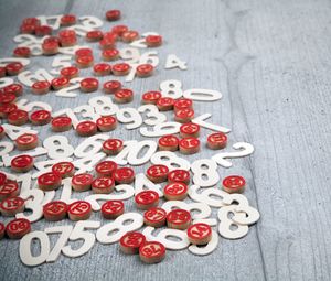 High angle view of numbers on wooden table