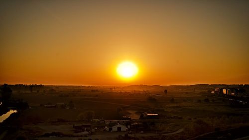 Scenic view of dramatic sky during sunset