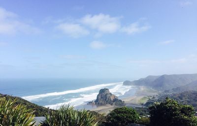 Scenic view of beach and sea against sky