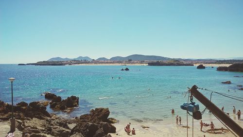 Scenic view of sea against clear blue sky