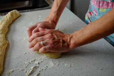 Close-up of person preparing food