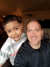 Portrait of smiling boy at home