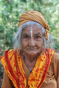 Close-up portrait of senior woman wearing traditional clothing