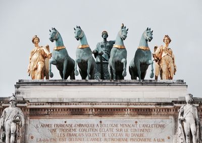 Statue of building against sky