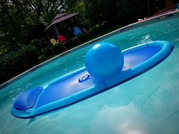 Blue floating on swimming pool
