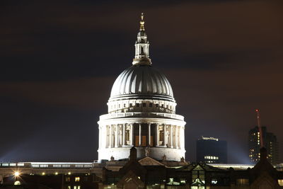 Low angle view of illuminated building at night