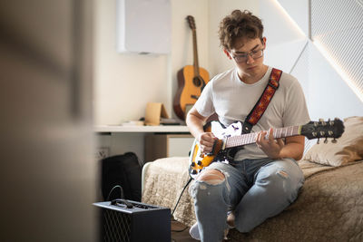 Young man playing guitar