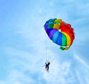 Low angle view of kite flying against sky