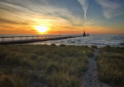 Scenic view of sea against sky during sunset