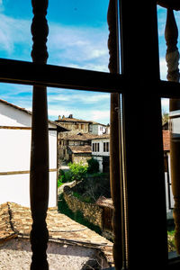 Buildings seen through window