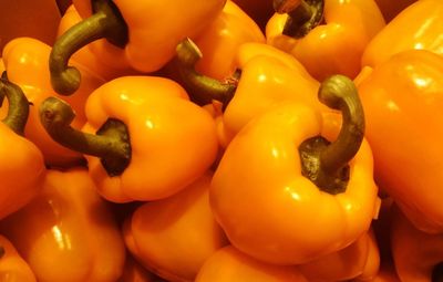 Close-up of yellow bell peppers for sale in market