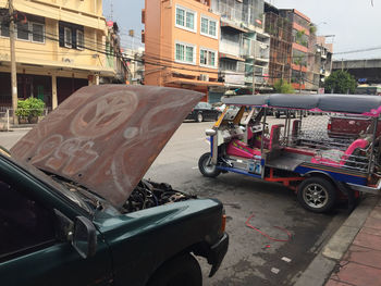 Cars on street in city