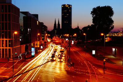 Light trails on city street at night