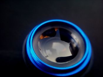 Close-up of coffee cup against black background