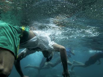 Men snorkeling in sea