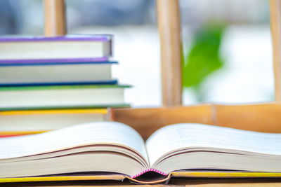 Open book on wooden table