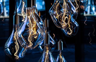 Close-up of illuminated lights hanging on table