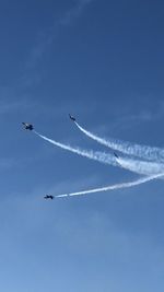 Low angle view of vapor trail in sky