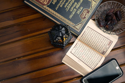 High angle view of open book on table