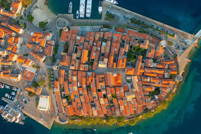 High angle view of illuminated buildings in city