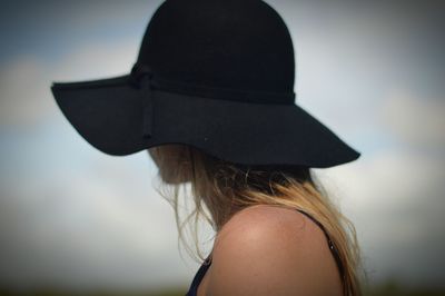 Close-up of young woman looking away