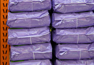 Full frame shot of stack of plastic bags with fertilizer