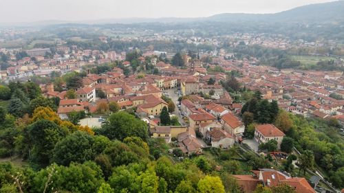 High angle view of townscape and trees in city