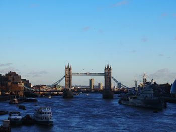 Tower bridge over thames river against sky