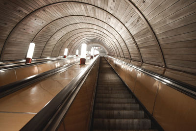 Elevated view of escalator in empty subway